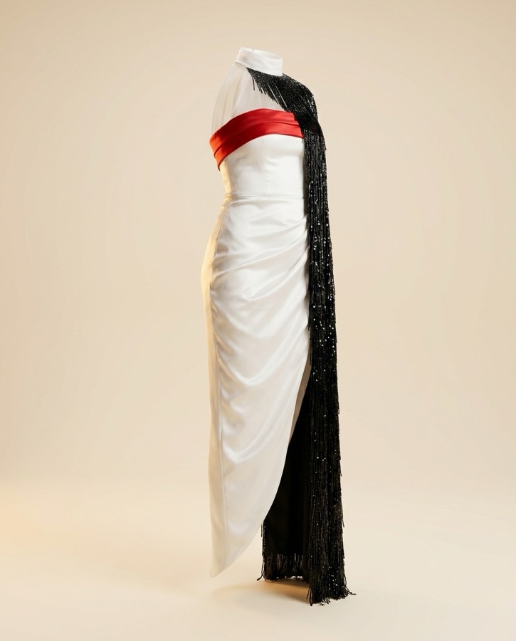 Caliente by Oscar B — ivory satin with black beaded fringe