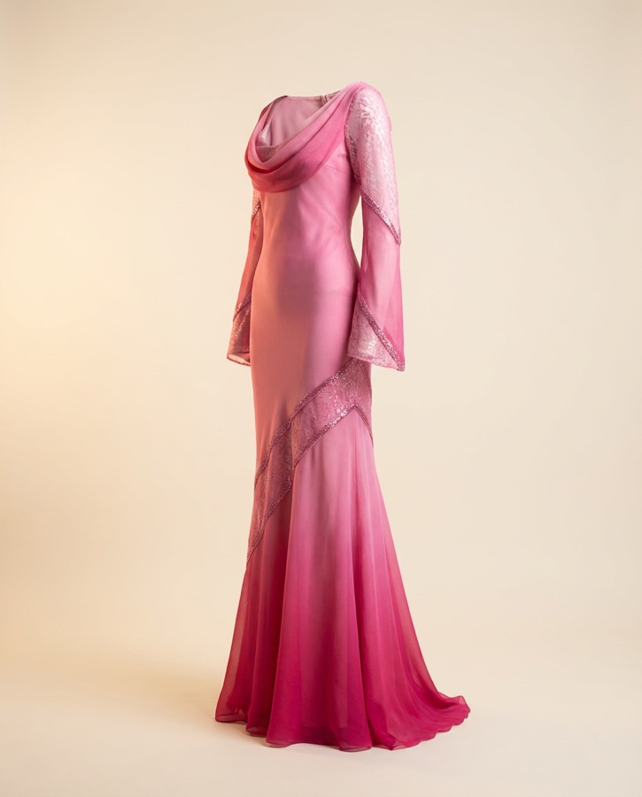 Caliente by Oscar B — magenta draped gown with silver trim