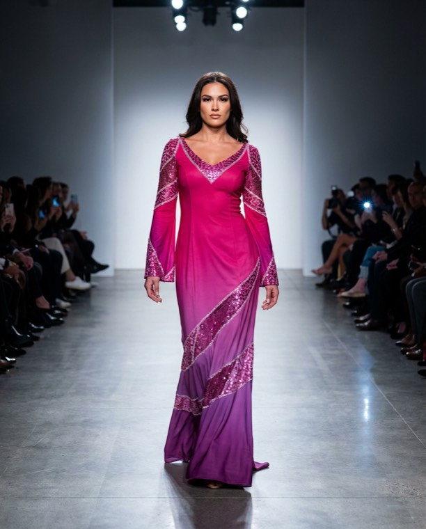 magenta draped gown with silver trim